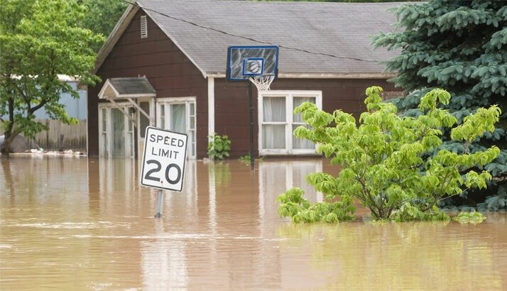 a house with water up to the windowsill